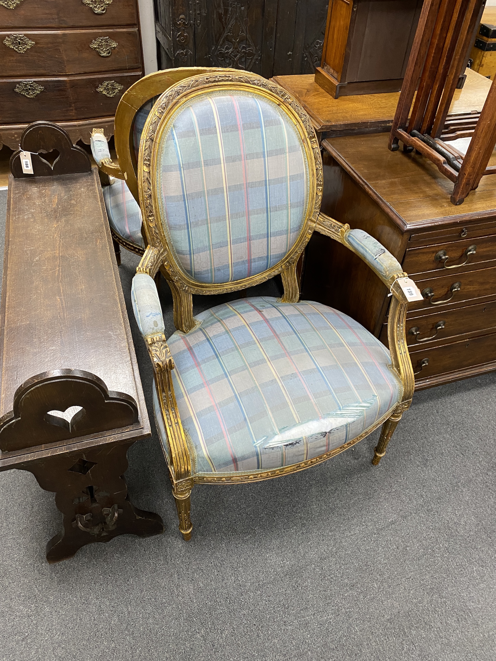 A set of four Louis XVI style giltwood and composition fauteuil, width 64cm, depth 54cm, height 107cm